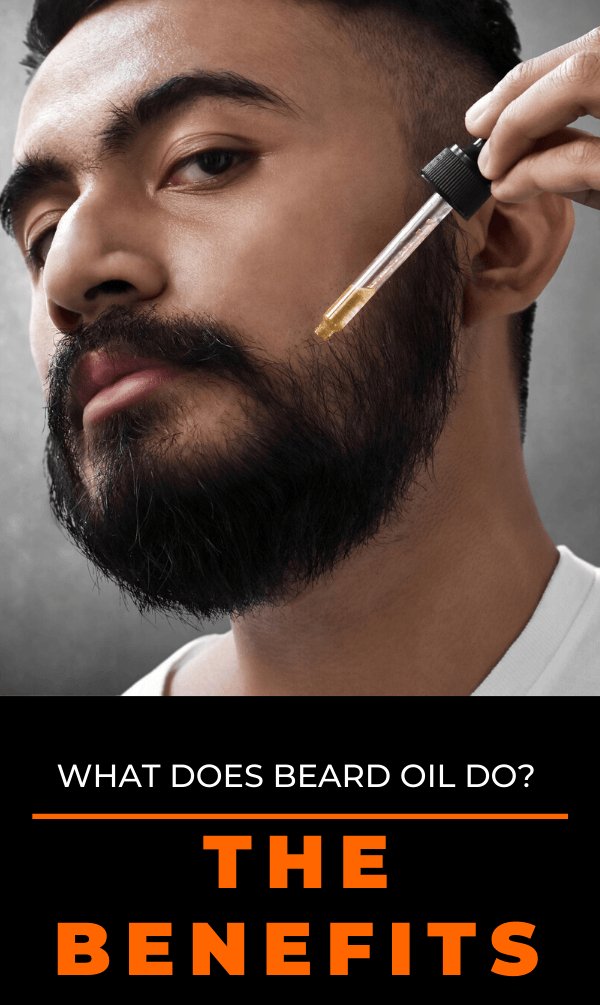 Man applying beard oil with dropper to full beard, showcasing beard grooming benefits