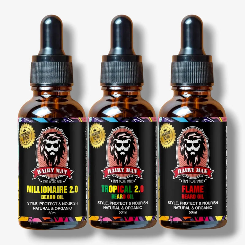 Three Hairy Man beard oil bottles: Millionaire, Tropical, and Flame 2.0, natural & organic, 50ml each