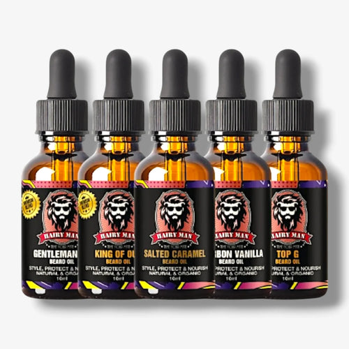 Five bottles of natural beard oil with dropper caps, featuring scents like Salted Caramel and Bourbon Vanilla.