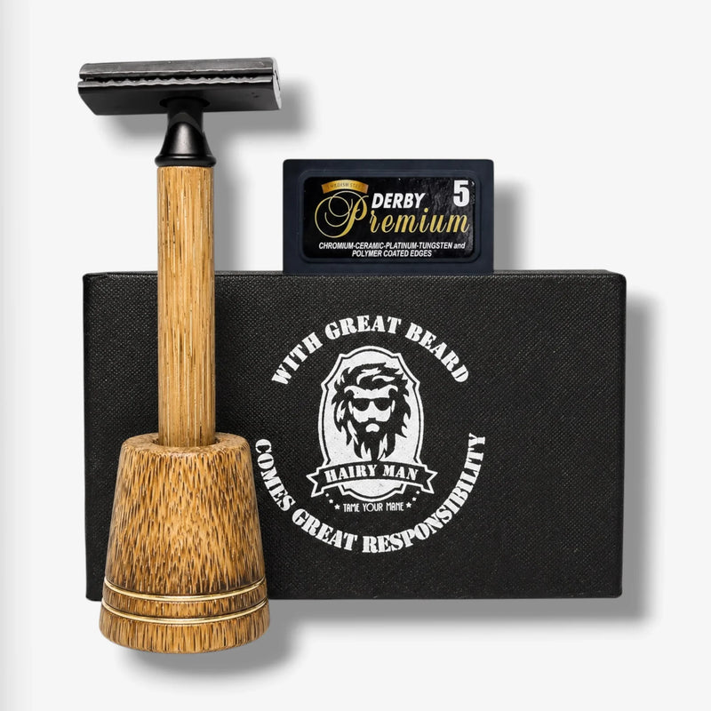 Bamboo safety razor with stand, Derby Premium blades, and Hairy Man beard care gift box for grooming.
