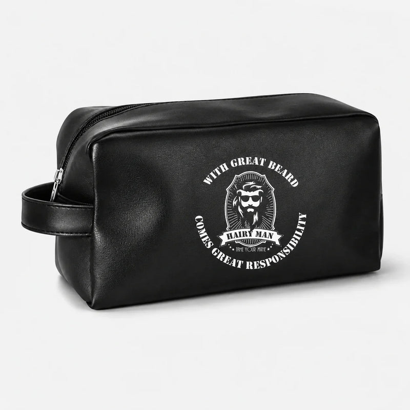Black leather toiletry bag with 'Hairy Man' beard care logo, ideal for grooming essentials.