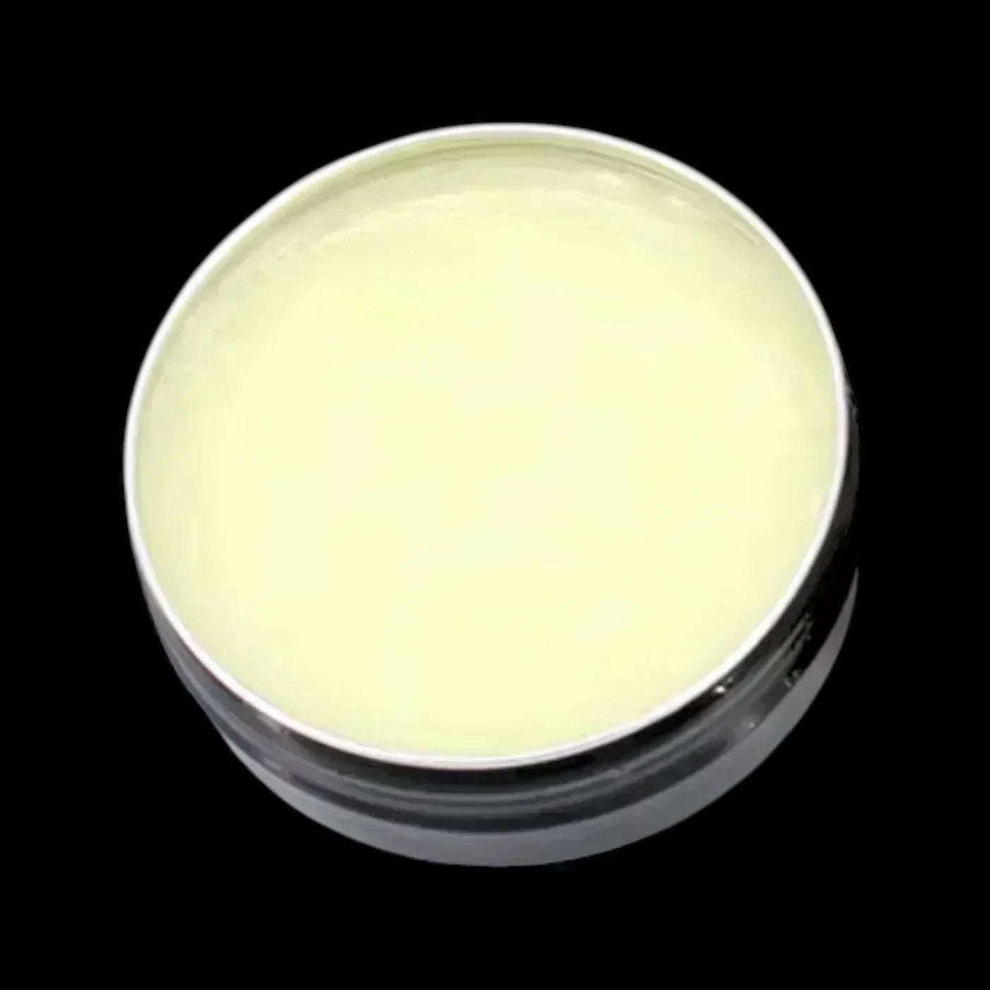 Hairy Man Care natural beard balm in tin against black background