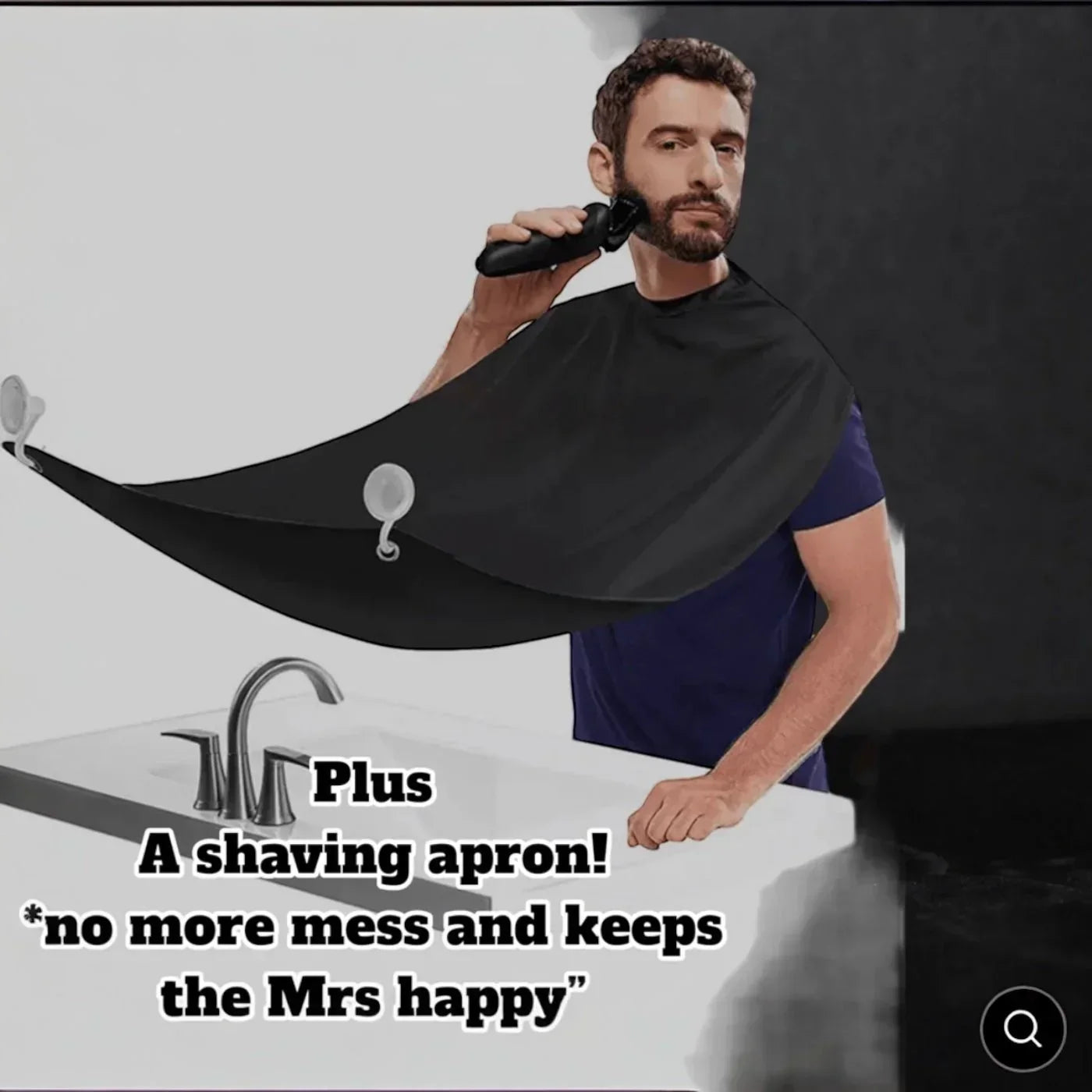 Man using electric shaver with black shaving apron to catch beard trimmings, mess-free grooming