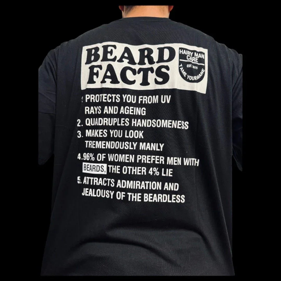 Black t-shirt with 'Beard Facts' print, featuring humorous beard benefits and Hairy Man Care logo on back.