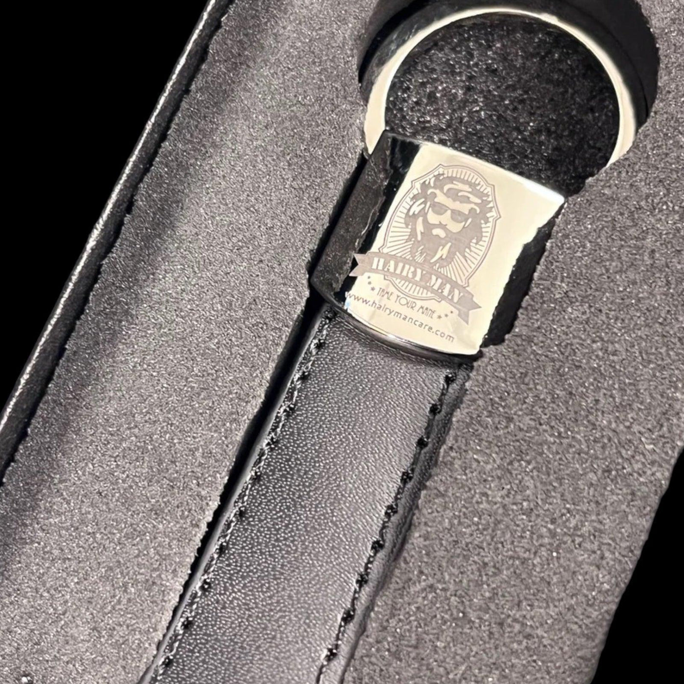 Hairy Man beard grooming kit with leather strap and branded tag, for taming beards naturally